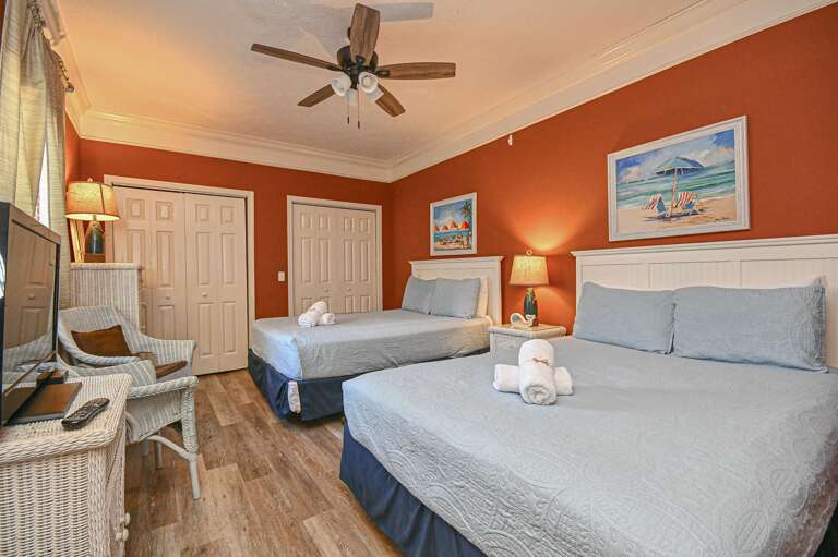 Spacious bedroom retreat with cozy lighting and modern comforts