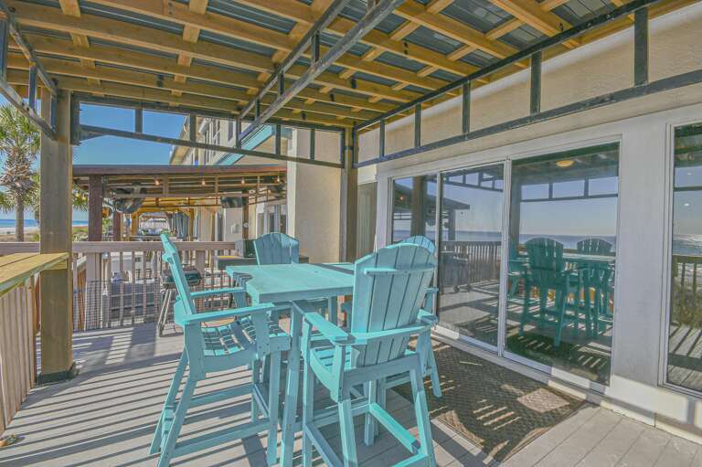 Sunlit patio with vibrant seating for lively gatherings
