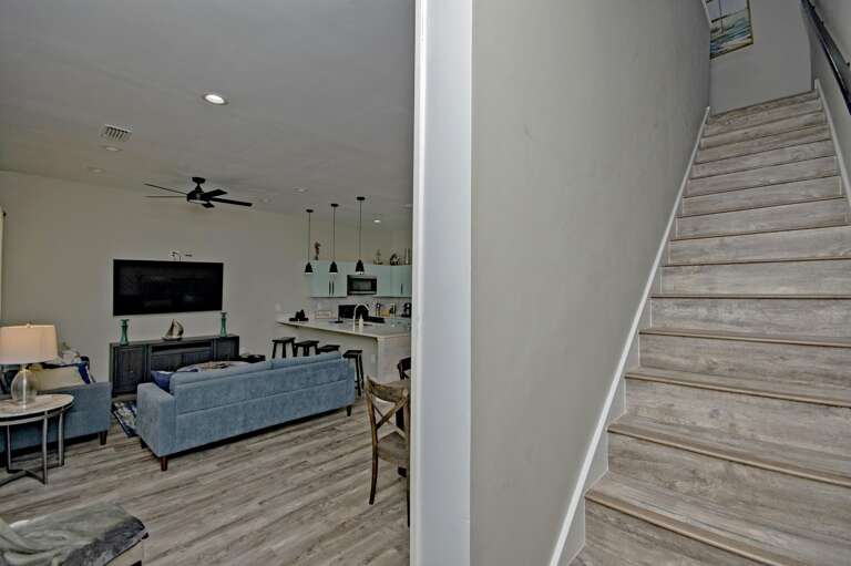 Bright and open living room with modern comforts and stylish decor