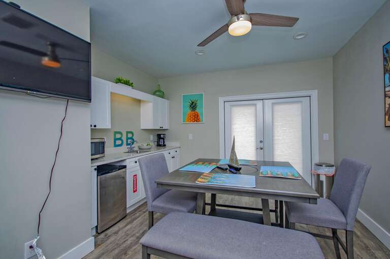 Cozy kitchen and dining area with bright natural light