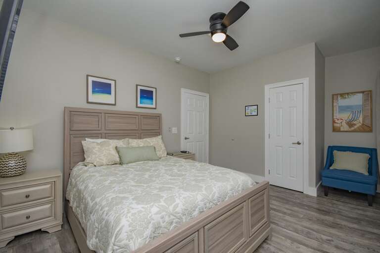 Cozy bedroom retreat with calming coastal decor and plush bedding