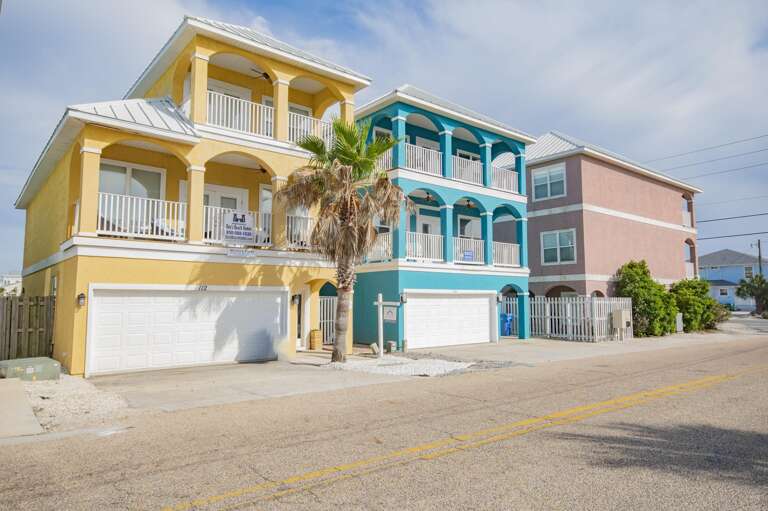 Colorful beachfront homes with spacious balconies and ocean views