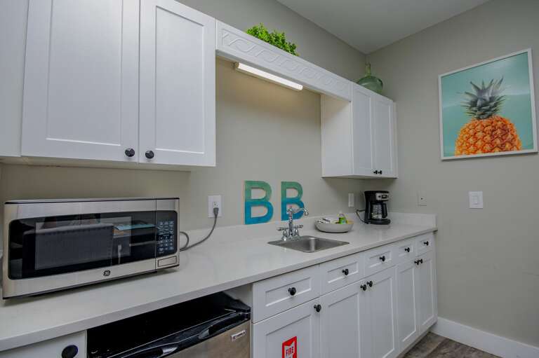 Bright, modern kitchen with ample storage and countertop space