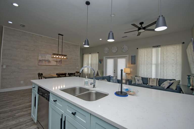 Modern kitchen with spacious island and open living area