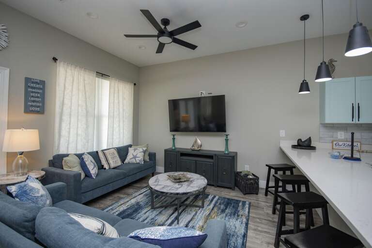 Cozy living room with modern decor and ample seating