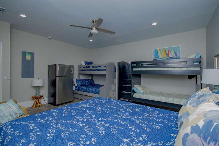 Spacious bedroom with cozy bunk beds and vibrant decor