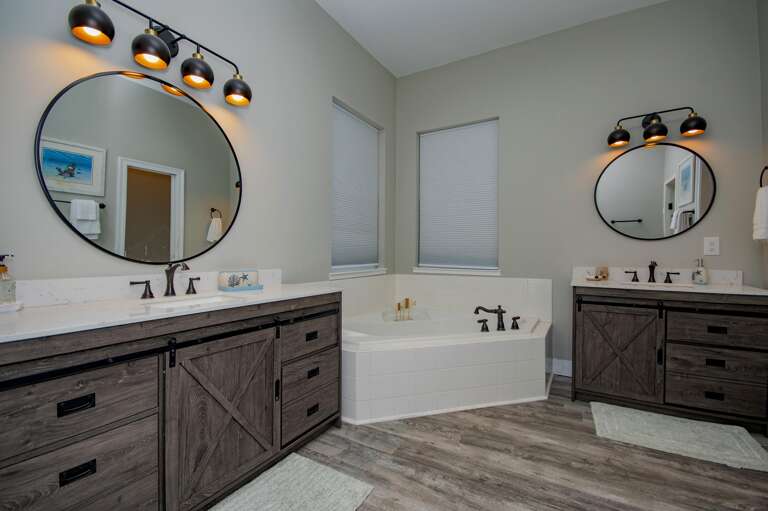 Spacious bathroom retreat with dual vanities and soaking tub