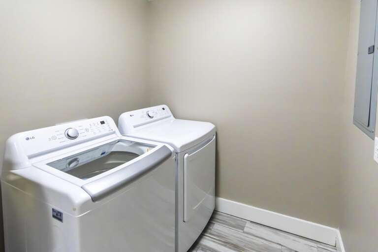 Bright, spacious laundry room with modern appliances