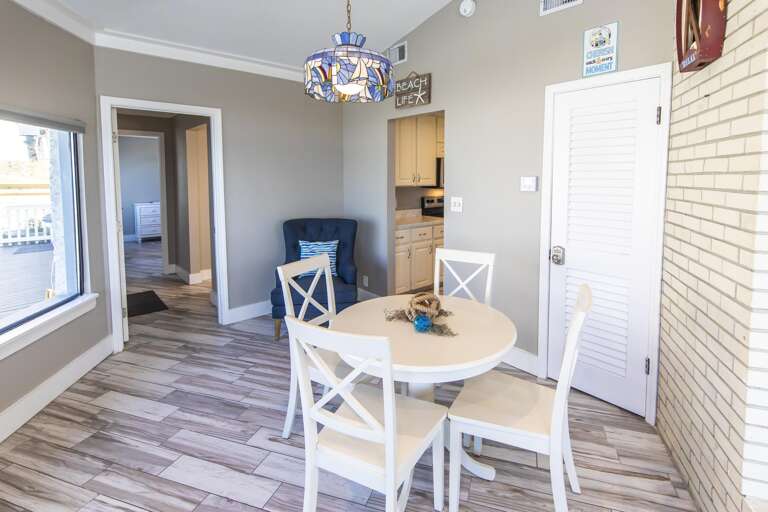 Bright dining nook with cozy seating and natural light