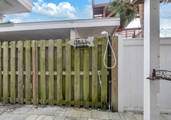 Outdoor shower area perfect for rinsing off after fun days