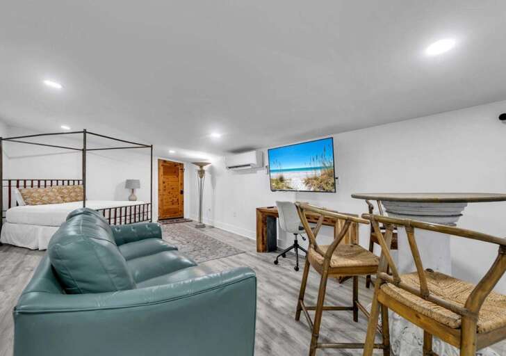 Cozy living area with plush seating and dining nook