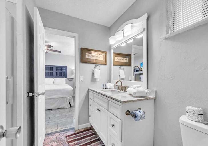 Bright, modern bathroom with cozy farmhouse charm and ample storage