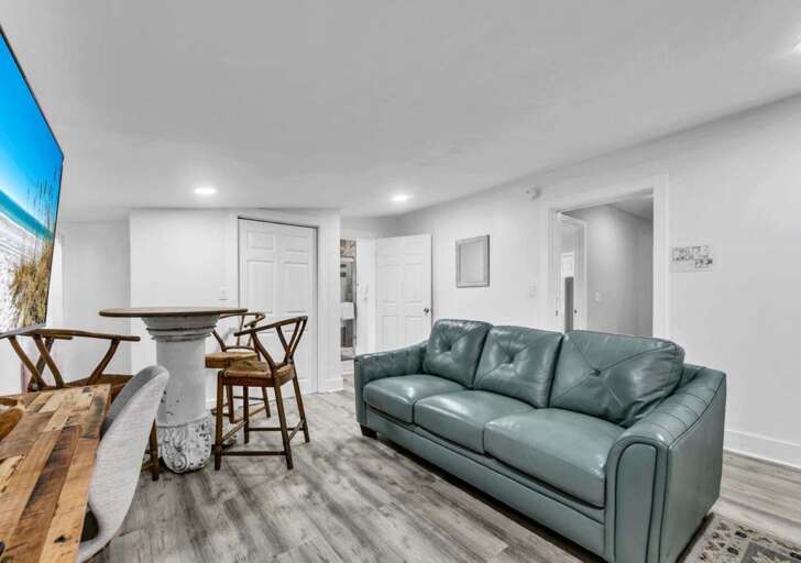 Cozy living room with stylish seating and vibrant art