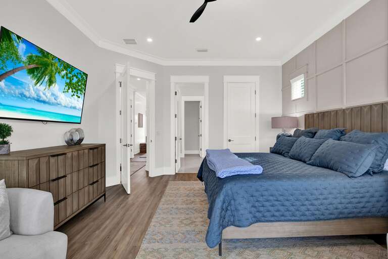 Spacious bedroom retreat with modern comfort and natural light