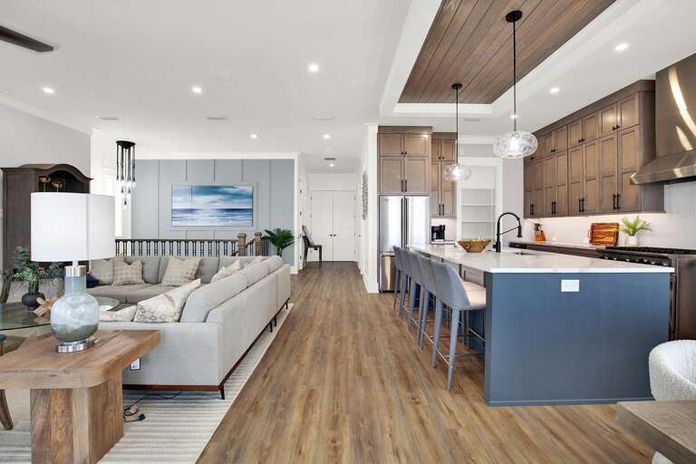 Spacious open-concept living room and kitchen with modern finishes