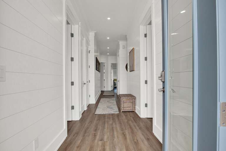 Bright, airy hallway leading to your cozy retreat