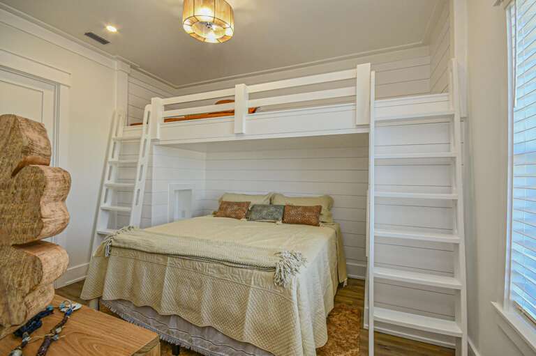 Cozy bedroom with spacious bunk bed for family comfort