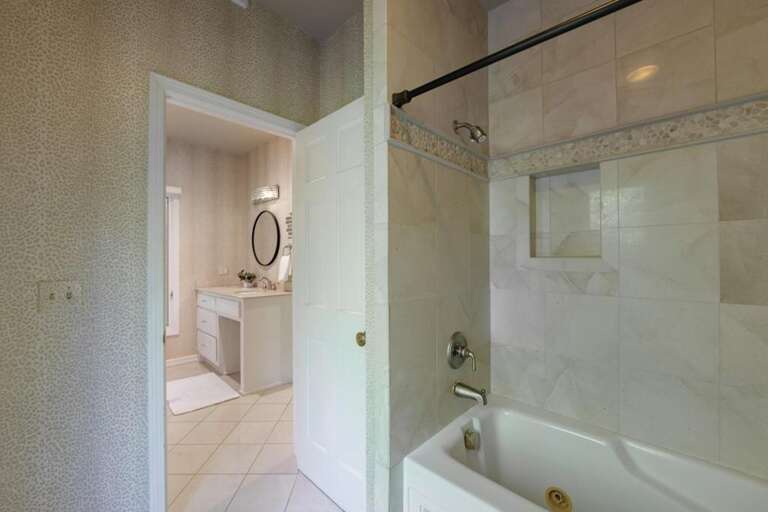 Bright bathroom with modern fixtures and spacious tub