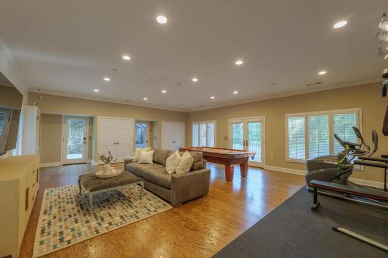 Spacious living room with cozy seating and natural light