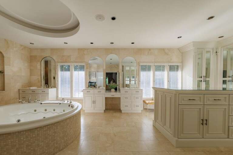 Luxurious spa bathroom with spacious soaking tub and elegant finishes