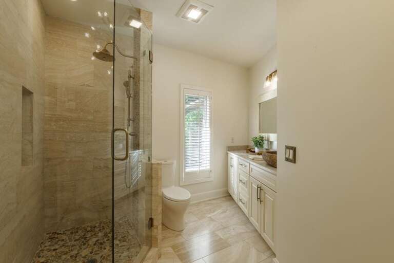 Spa-inspired bathroom with spacious walk-in shower and natural light