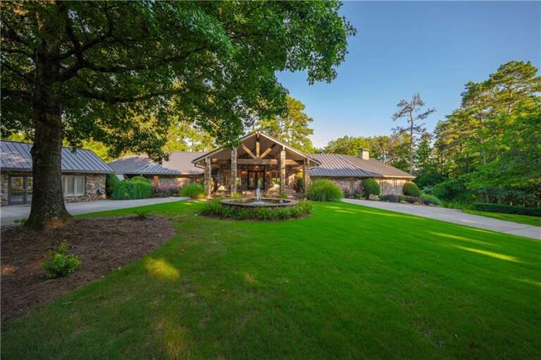 Spacious backyard retreat with cozy covered patio and fire pit