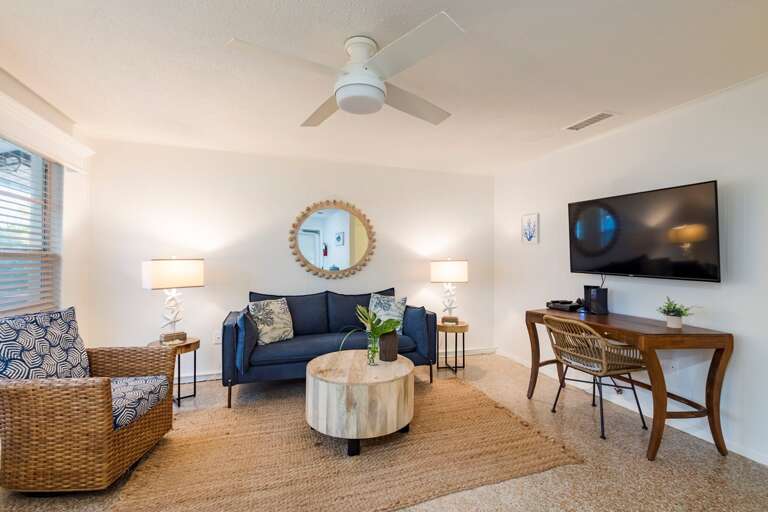 Bright Beachside Living Space, Bamboo-backed Chairs, Breezy Ceiling Fan, Nautical Nuances