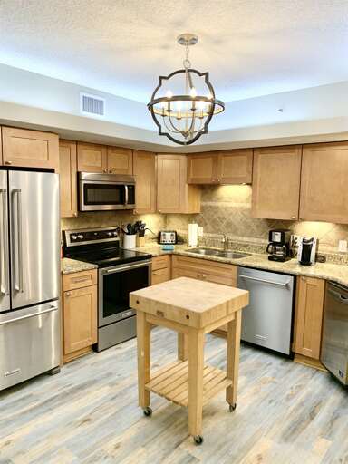 All new stainless KitchenAid appliances and Manitowac ice machine