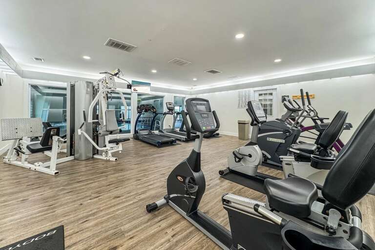SH Gym looking from the far corner back at the Indoor pool and equipment.  