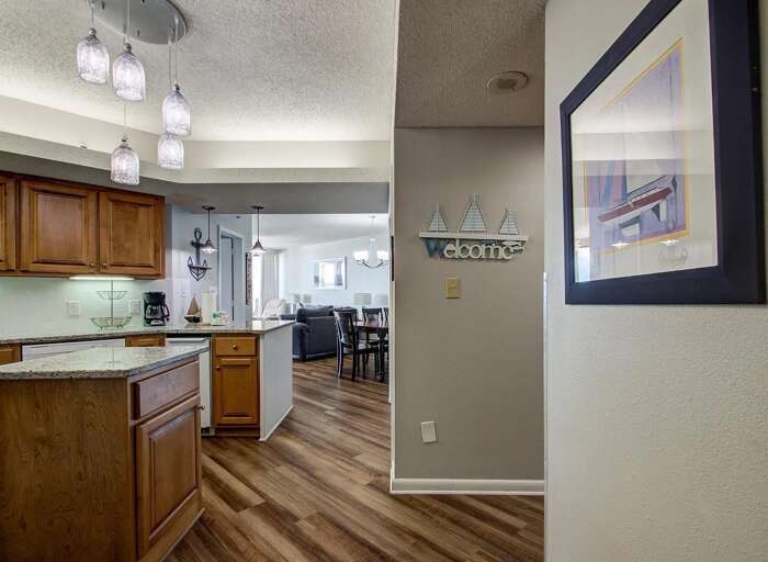 Entering 702A, beautiful wood and beach decor!