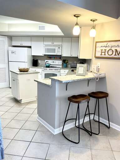 Bar seating for two.  Great breakfast area or laptop station.