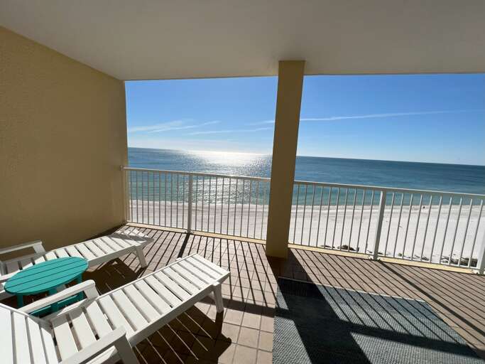 Relax on the patio directly on the beach!