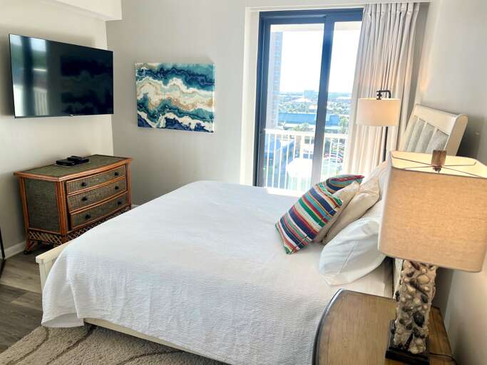 2nd bedroom has king bed and large Roku TV 