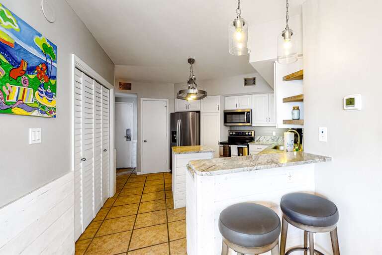 From the dining room, looking back towards the Entry and Kitchen.  Laundry is on the left.