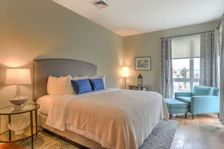 Master Bedroom with floor to ceiling corner windows Master Bedroom with floor to ceiling corner windows