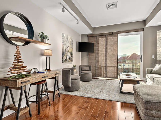 Living room has privacy shades. Beautiful mountain and sunset views. Living room has privacy shades. Beautiful mountain and sunset views.