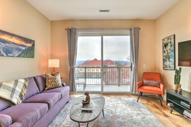 Living Room opens to Balcony with Views Living Room opens to Balcony with Views