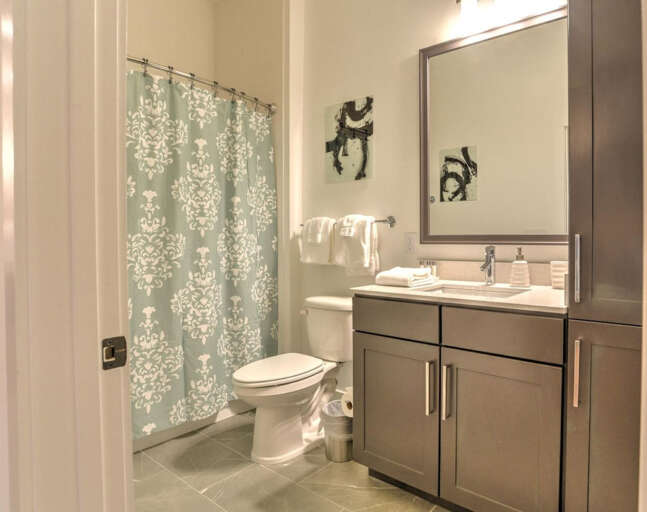 En suite bathroom with tub and shower