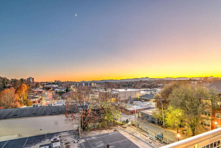 View From Balcony At Sunset Overlooking A Vibrant Valley