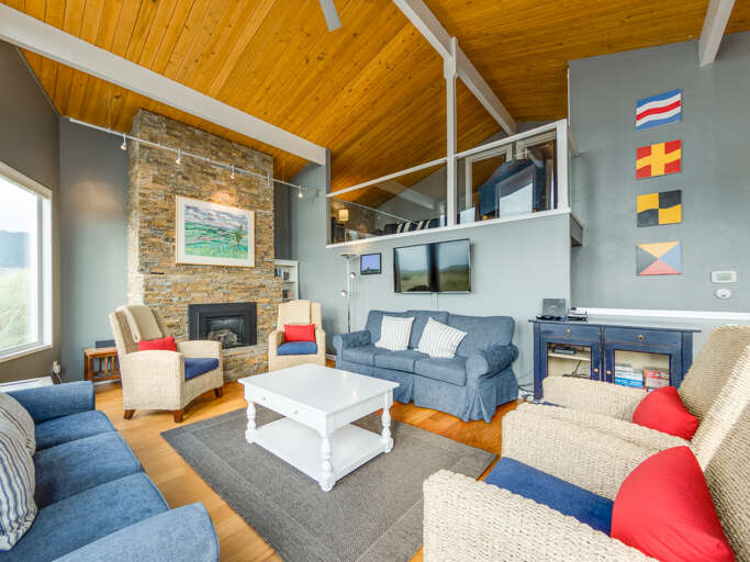 Open living space with Gas Fireplace and Smart TV.