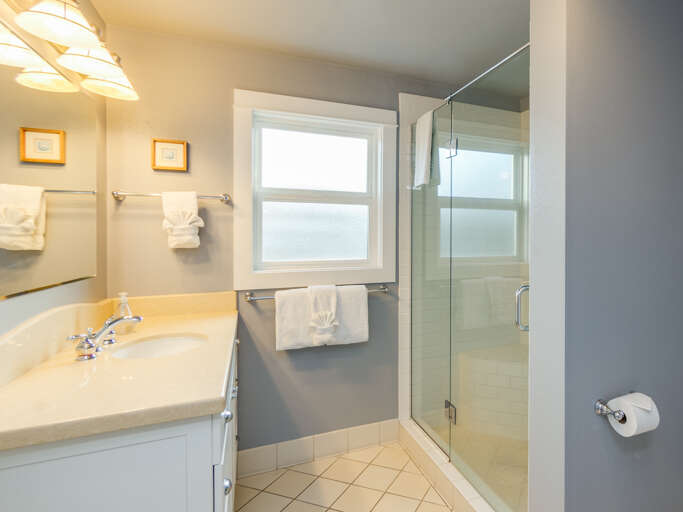 Main floor bathroom with sit down shower