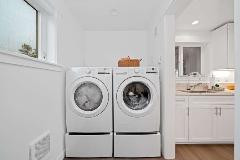 New washer and dryer in laundry room off the kitchen with access to 1/2 bath on main floor.  New washer and dryer in laundry room off the kitchen with access to 1/2 bath on main floor.