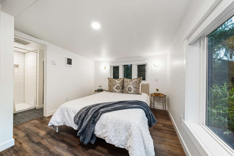 Upstairs 2nd queen bedroom with access to jack and jill full bath with walk in shower. 