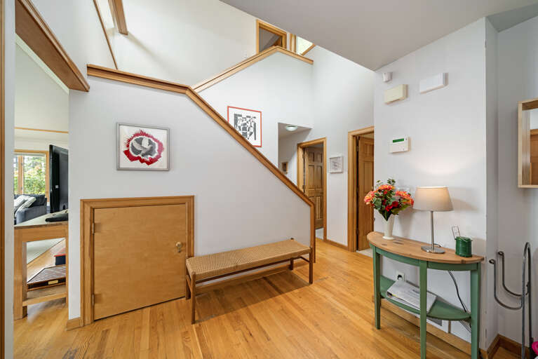 Entry area with large closet for coats, bags or to store luggage.