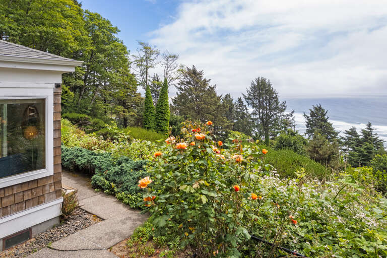 Off the dining area, you will find beautiful views and access to the fenced-in yard. 