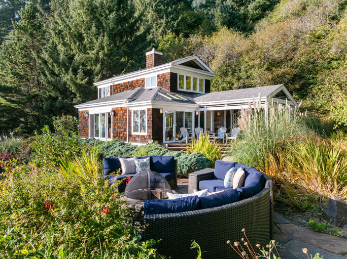 Firepit and front garden area of the home. 
