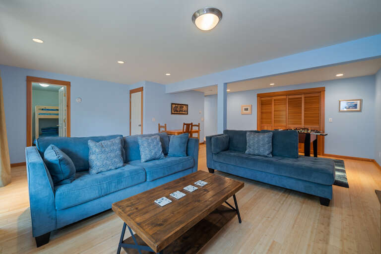 Downstairs family room with Smart TV, Foosball table and bunk room with 1 bunk bed. With access to lower deck and small back yard area.  Downstairs family room with Smart TV, Foosball table and bunk room with 1 bunk bed. With access to lower deck and small back yard area.