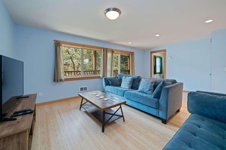 Downstairs family room with Smart TV, Foosball table and bunk room with 1 bunk bed. With access to lower deck and small back yard area.  Downstairs family room with Smart TV, Foosball table and bunk room with 1 bunk bed. With access to lower deck and small back yard area.