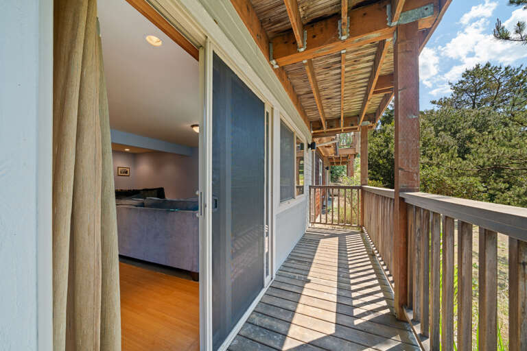 Lower deck with access to small back yard area. Lower deck with access to small back yard area.