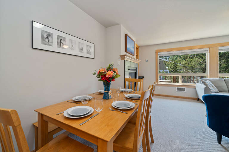 Open dining, kitchen, and living space with gas fireplace, and access to upper deck area.  Open dining, kitchen, and living space with gas fireplace, and access to upper deck area.